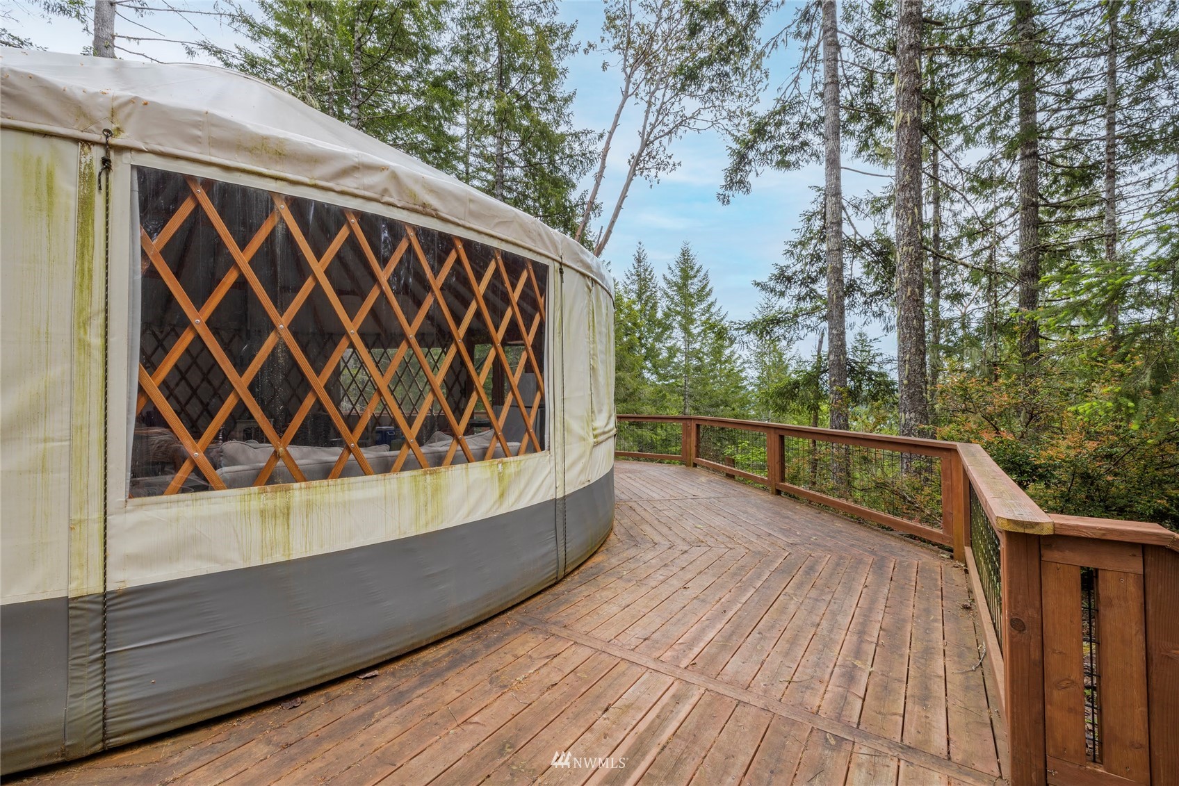 1630 Northeast Hurd Road Belfair, WA 98528 - Photo 12 of 28 a view of balcony with wooden floor and fence