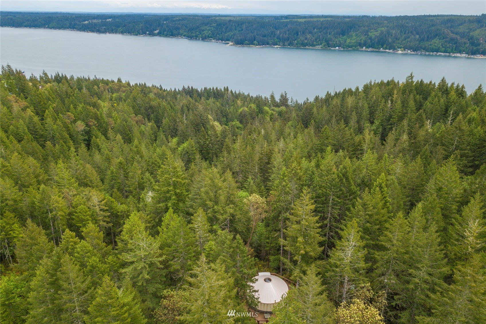 1630 Northeast Hurd Road Belfair, WA 98528 - Photo 21 of 28 a view of a lake from a yard