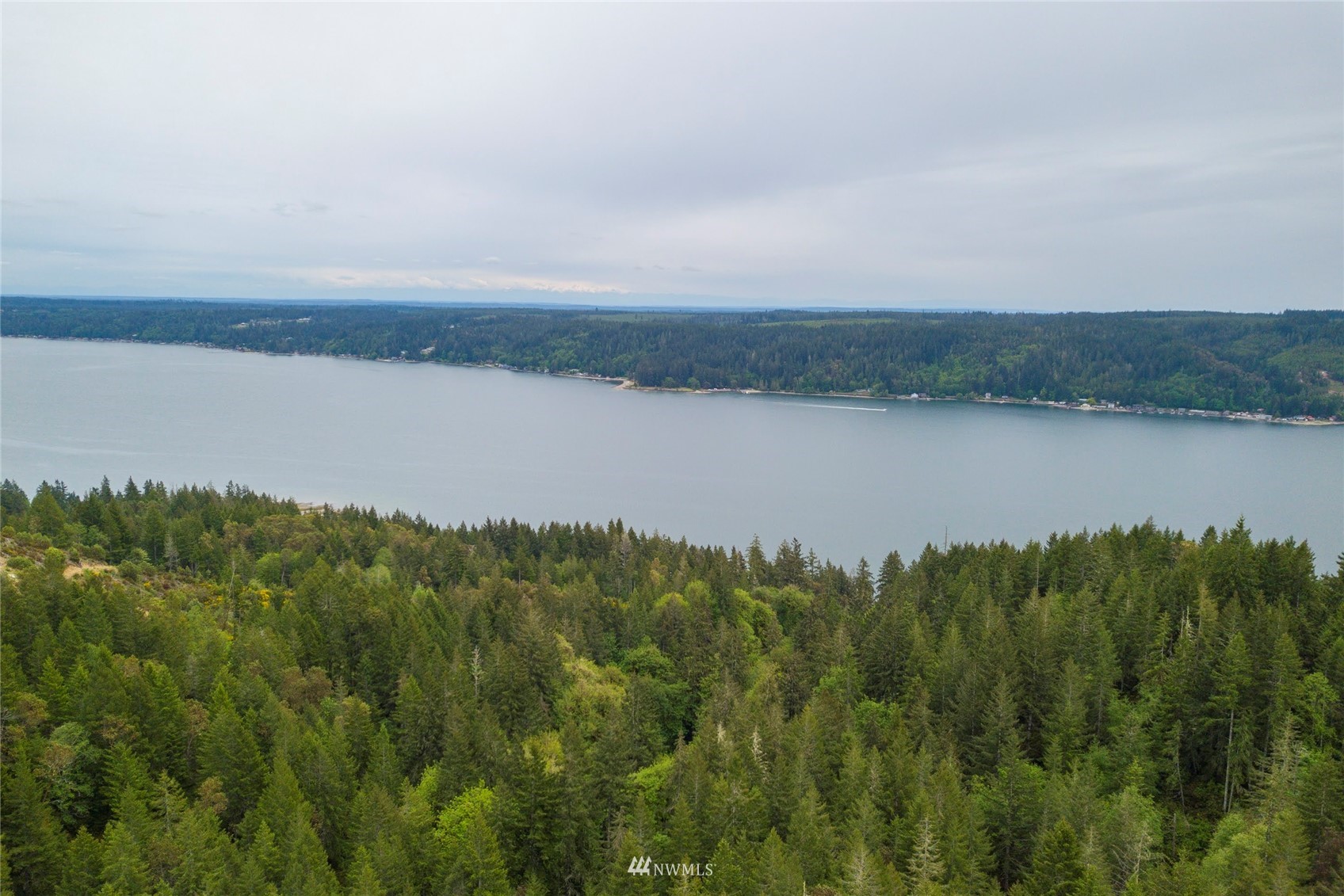 1630 Northeast Hurd Road Belfair, WA 98528 - Photo 24 of 28 a view of a lake and mountain in the back