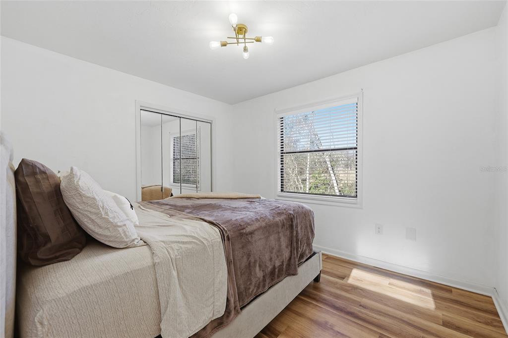 6612 Northwest 44th Place Gainesville, FL 32606 - Photo 21 of 34 a bedroom with bed and window