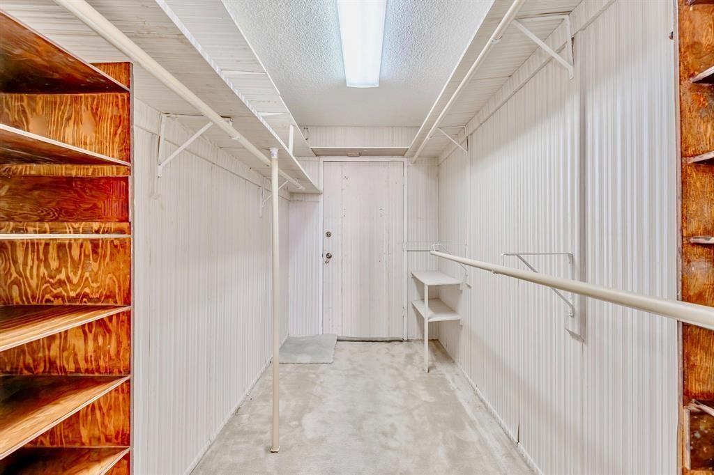 18031 Biscayne Boulevard, Unit 1104 Aventura, FL 33160 - Photo 16 of 35 a view of walk in closet with empty racks