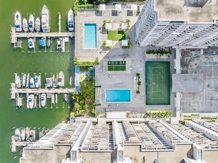 a view of multiple houses with a yard