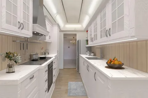 a kitchen that has a sink and a stove