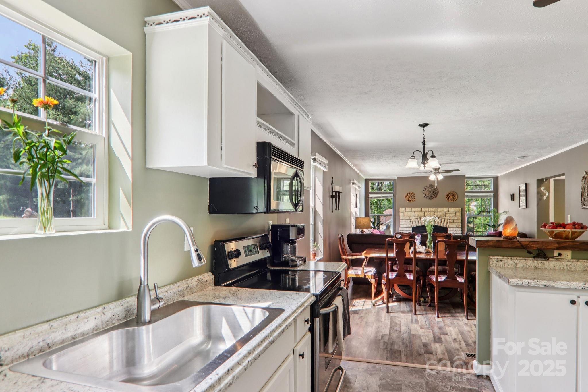 1282 Spicer Cove Road Hendersonville, NC 28792 - Photo 8 of 42 a kitchen with lots of counter top space