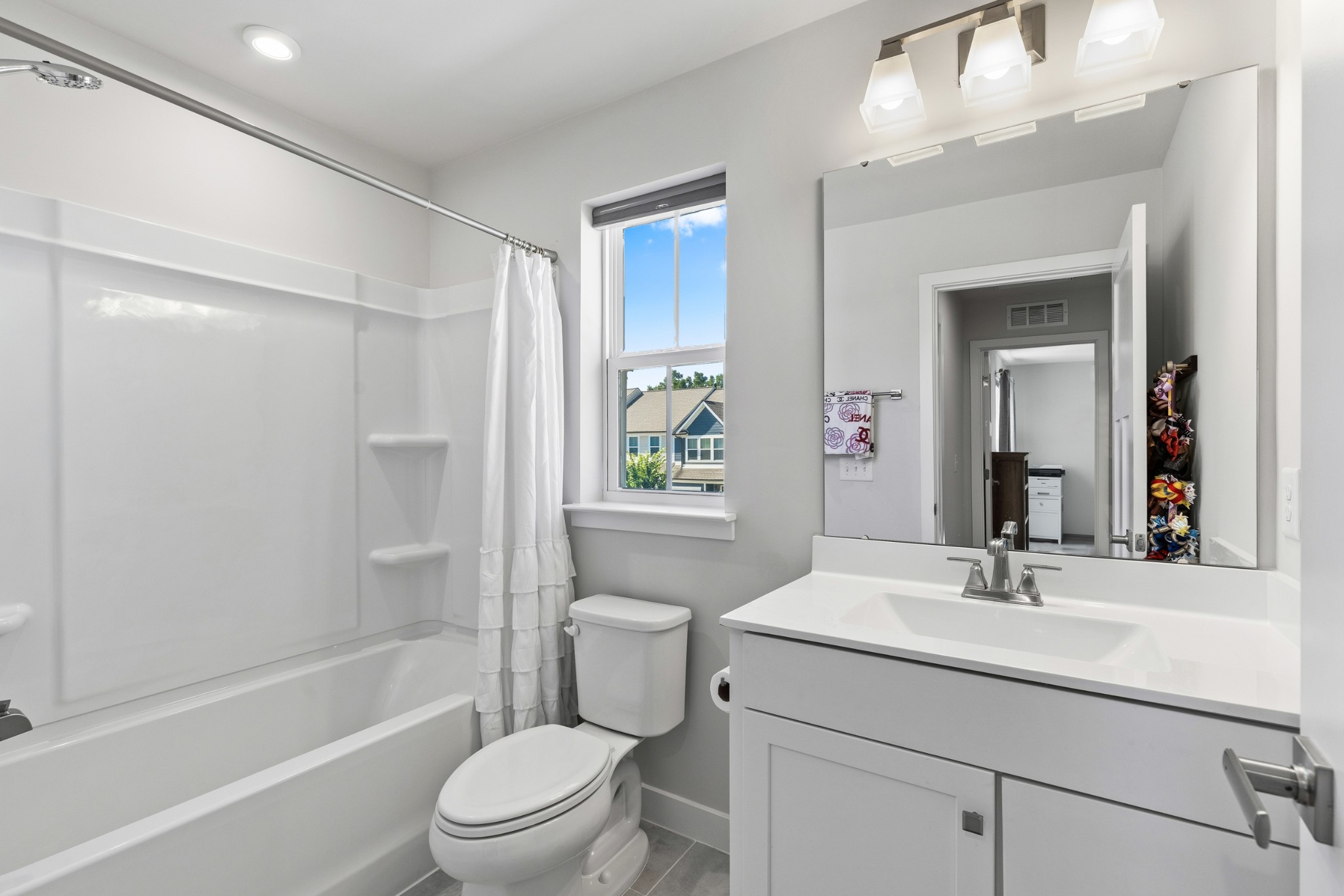 203 Pitchfork Way Gallatin, TN 37066 - Photo 32 of 39 a bathroom with a sink a toilet and shower