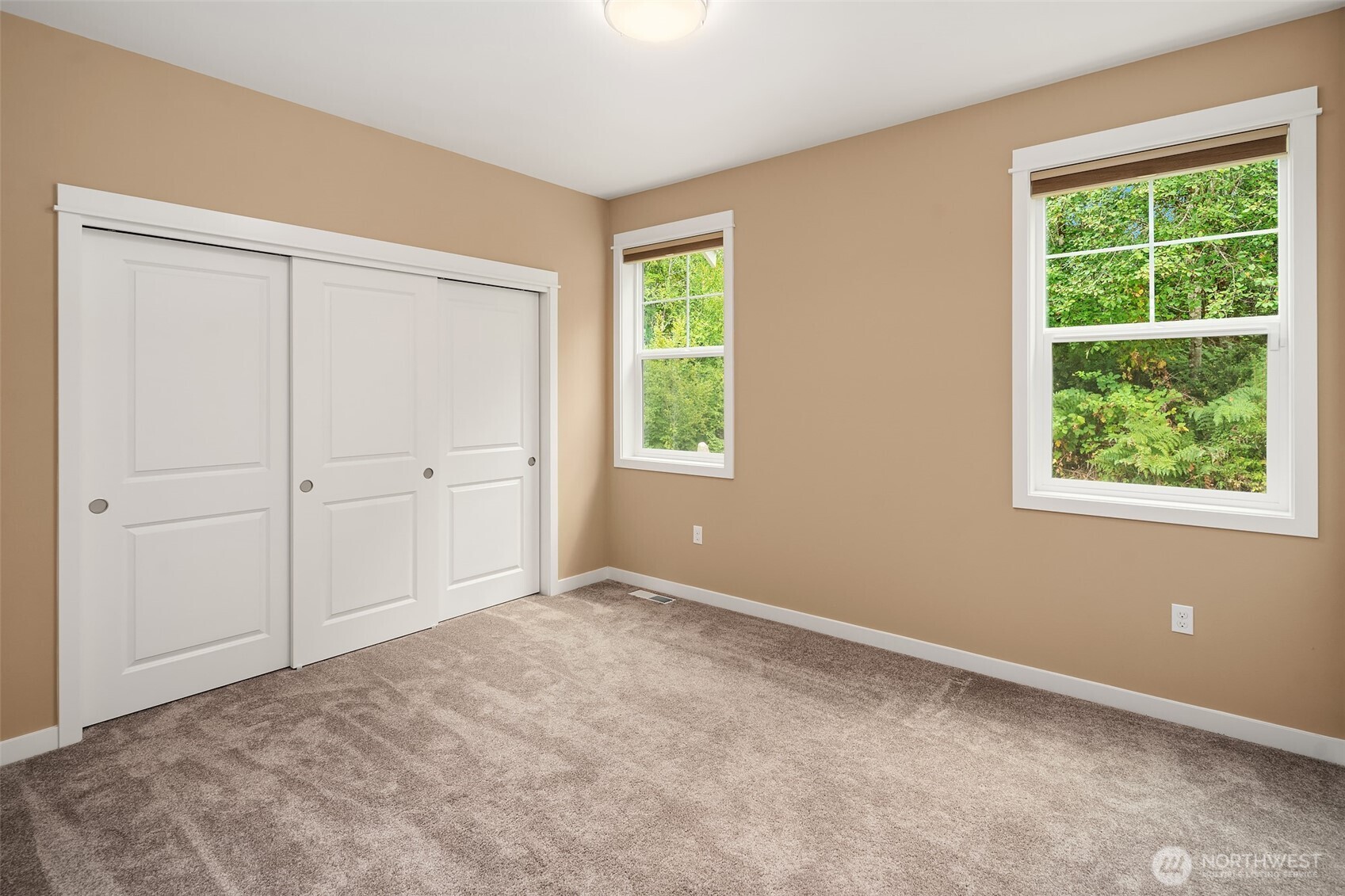216 Cornwall Road Northwest Lakebay, WA 98349 - Photo 23 of 34 a view of an empty room with a window