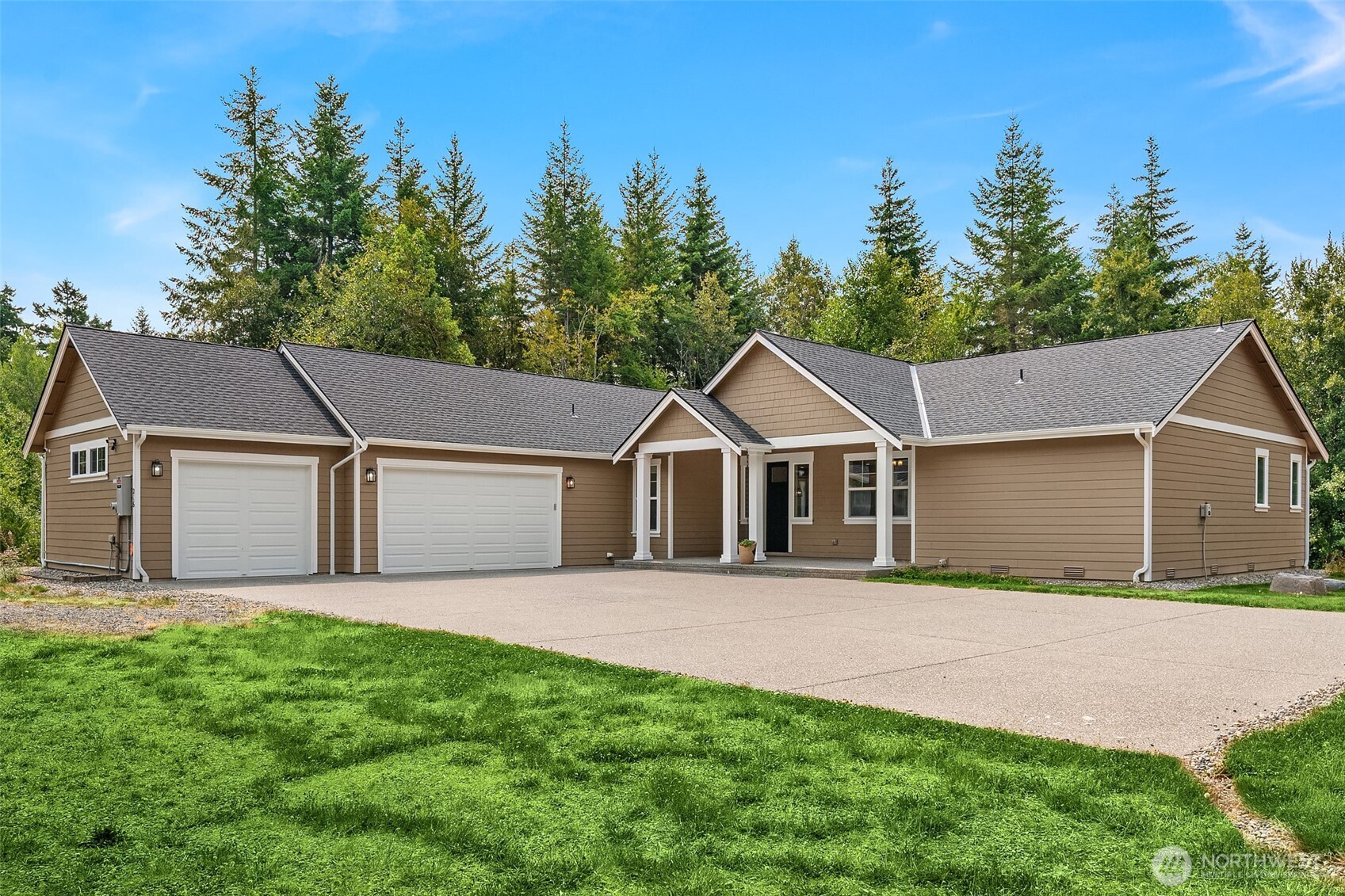 216 Cornwall Road Northwest Lakebay, WA 98349 - Photo 3 of 34 front view of a house with a yard