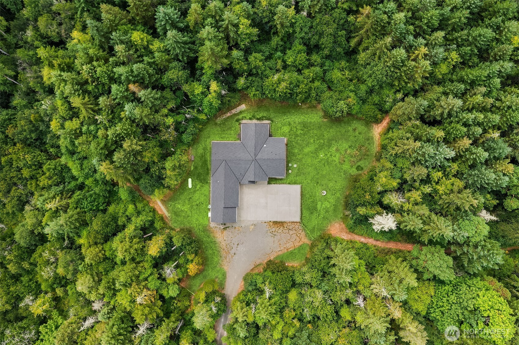 216 Cornwall Road Northwest Lakebay, WA 98349 - Photo 5 of 34 an aerial view of a house with a yard