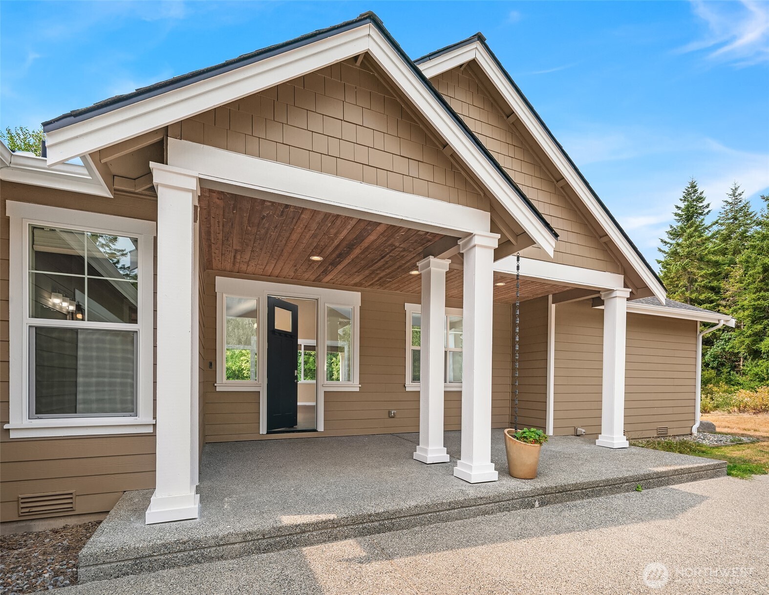 216 Cornwall Road Northwest Lakebay, WA 98349 - Photo 6 of 34 a view of a house with entrance door