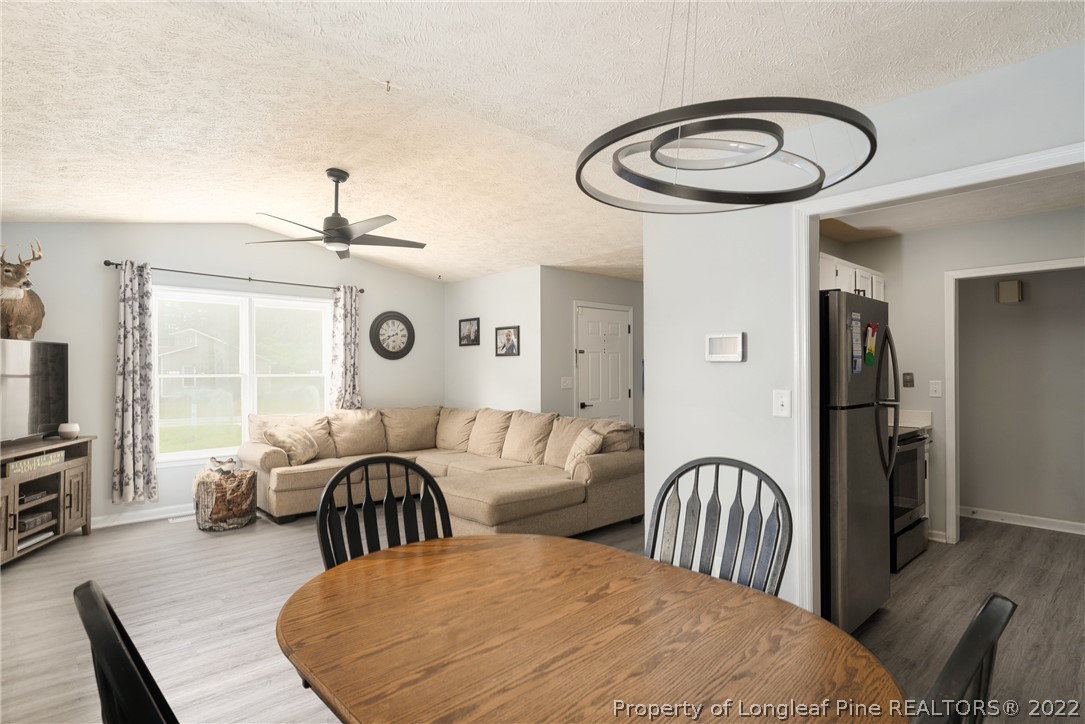 1742 Rim Road Fayetteville, NC 28314 - Photo 13 of 21 a view of a livingroom with furniture and a large window