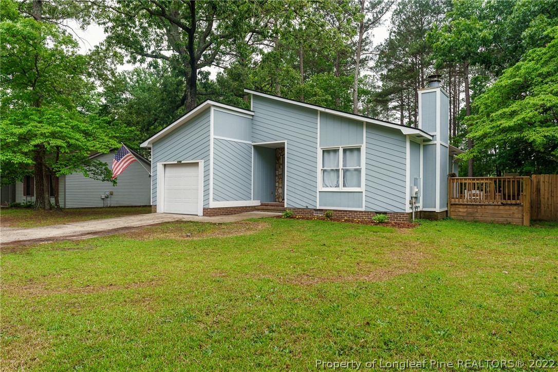1742 Rim Road Fayetteville, NC 28314 - Photo 2 of 21 a house with a outdoor space