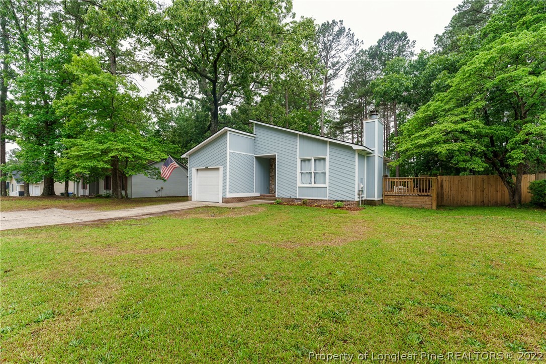 1742 Rim Road Fayetteville, NC 28314 - Photo 3 of 21 a view of a house with a backyard