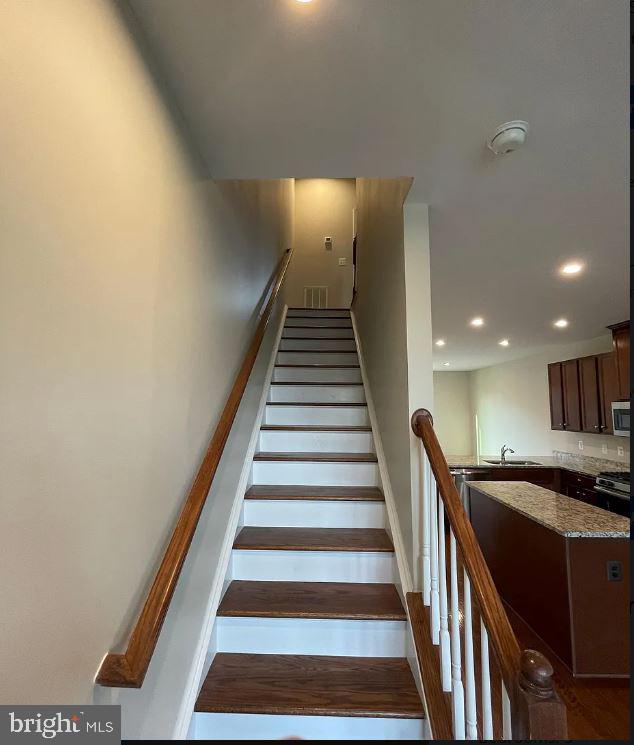 43855 Stubble Cor Square Ashburn, VA 20147 - Photo 12 of 38 a view of entryway and hall with wooden floor