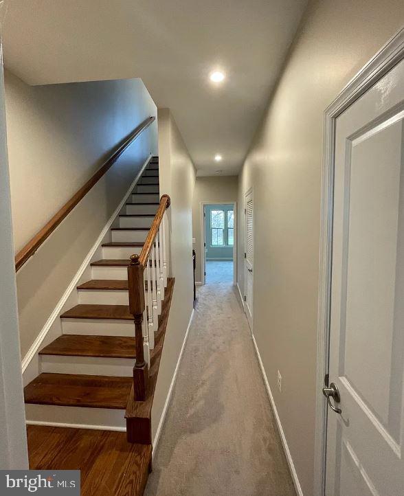 43855 Stubble Cor Square Ashburn, VA 20147 - Photo 22 of 38 a view of entryway and hall with wooden floor