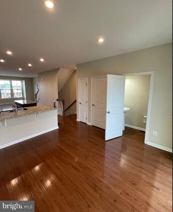 43855 Stubble Cor Square Ashburn, VA 20147 - Photo 10 of 38 a view of a room with wooden floor