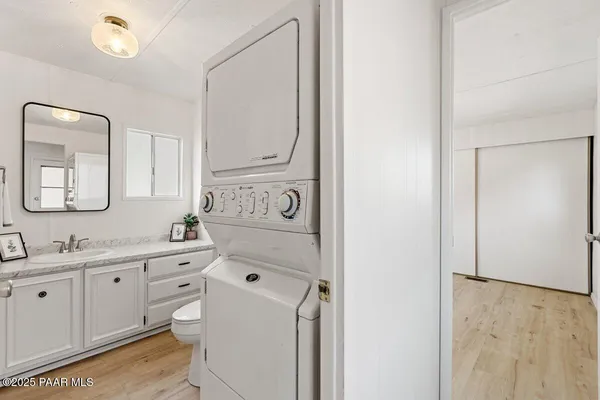 a view of bathroom with dual sinks