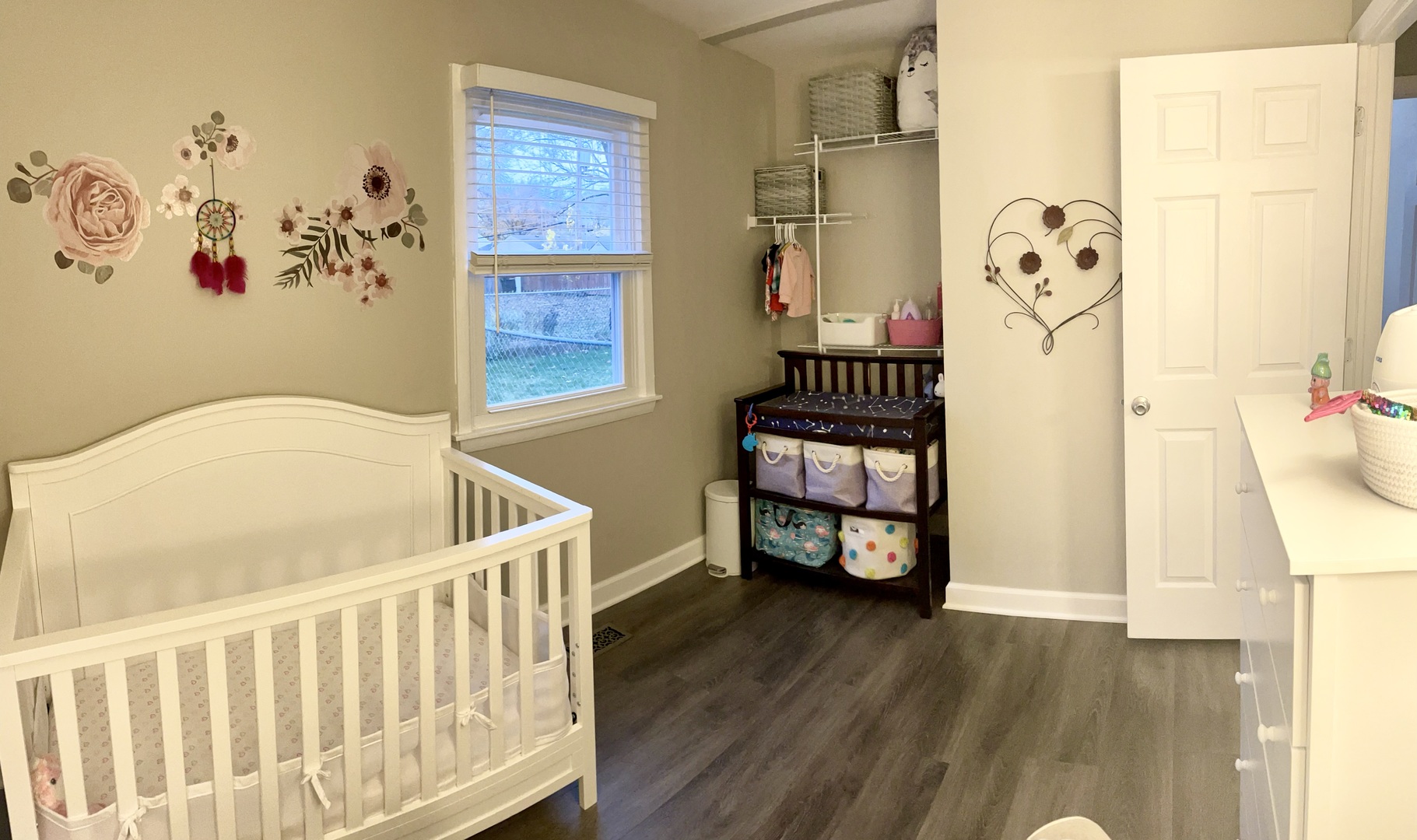 67 Stratford Road Montgomery, IL 60538 - Photo 16 of 33 a bedroom with a bed and a table with wooden floor