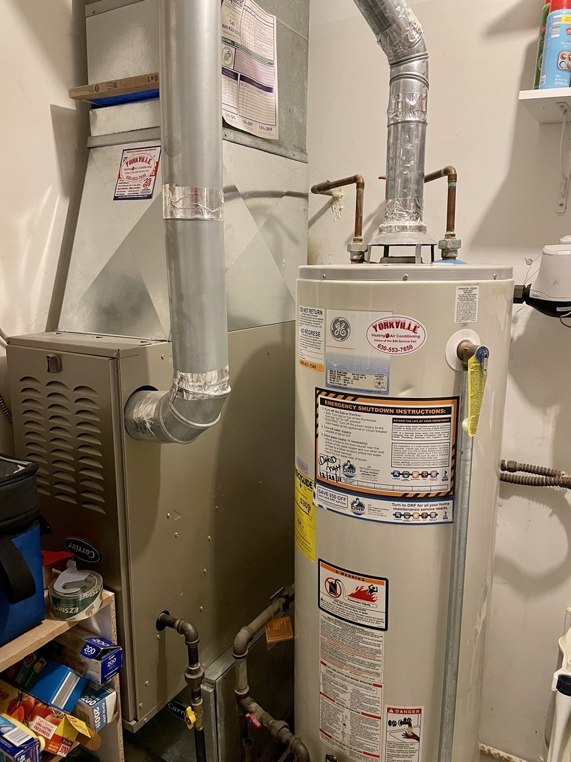 67 Stratford Road Montgomery, IL 60538 - Photo 23 of 33 a close view of water heater room