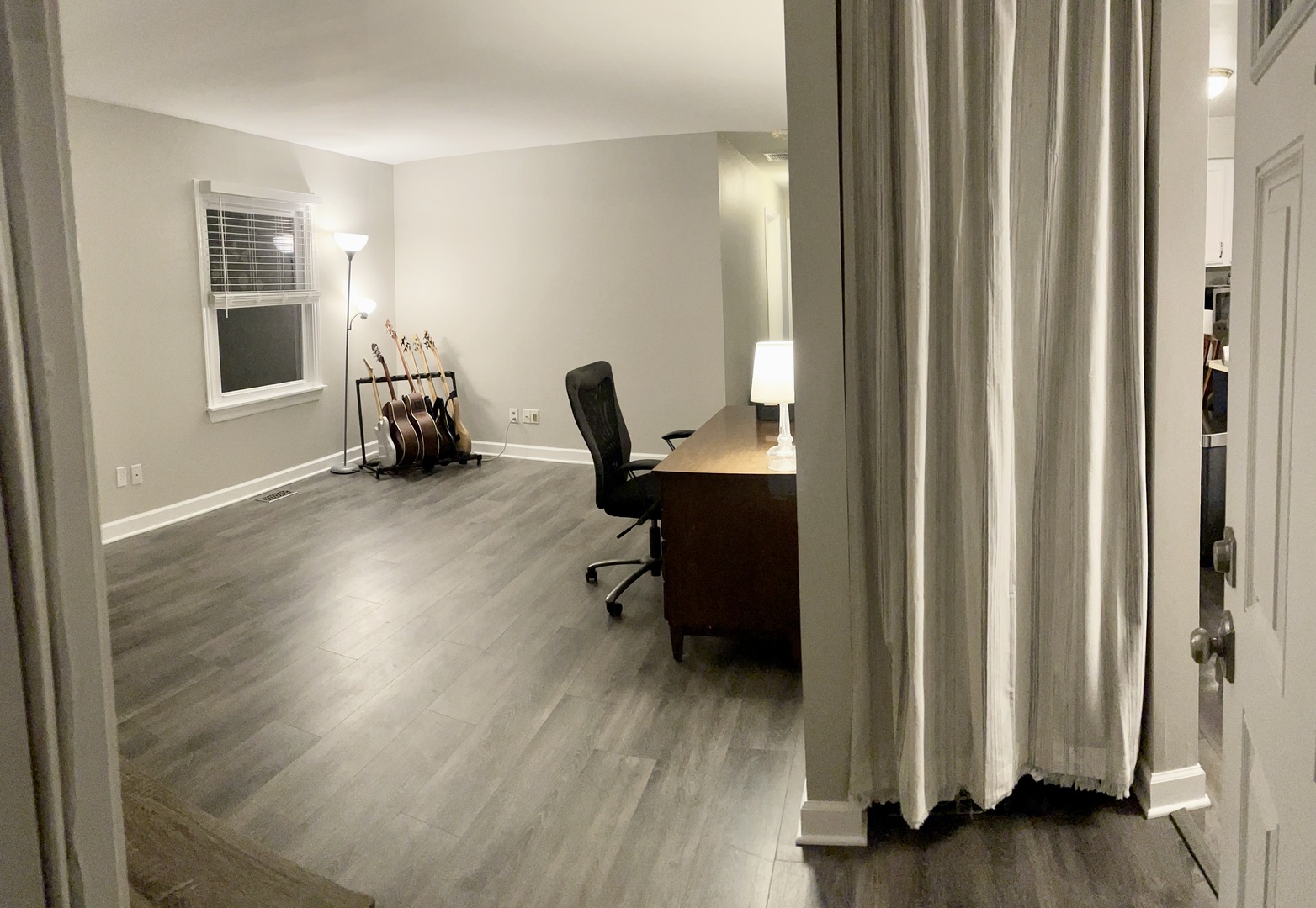 67 Stratford Road Montgomery, IL 60538 - Photo 5 of 33 a view of a workspace with furniture and wooden floor