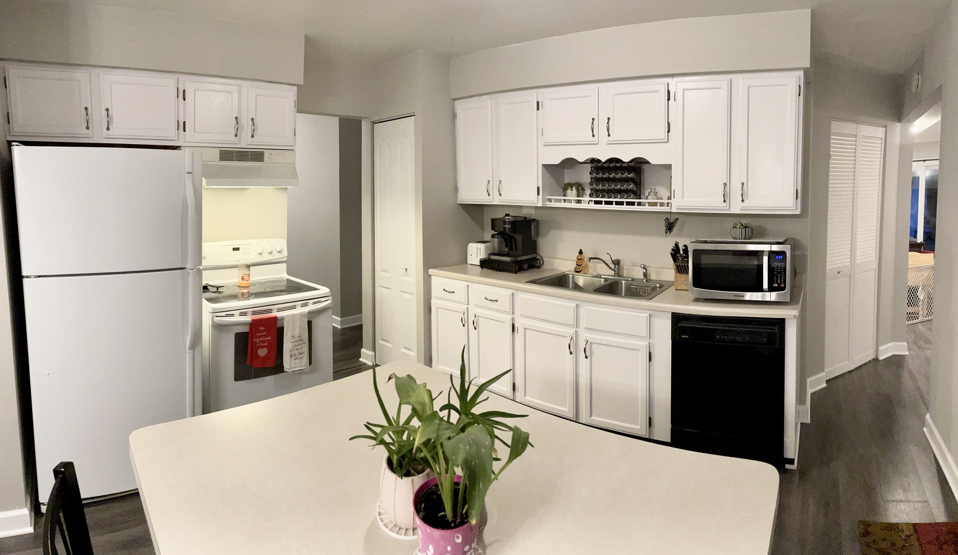 67 Stratford Road Montgomery, IL 60538 - Photo 7 of 33 a kitchen with stainless steel appliances a refrigerator a stove a sink a microwave and cabinets