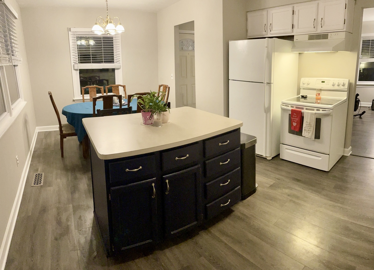 67 Stratford Road Montgomery, IL 60538 - Photo 8 of 33 a kitchen with a sink cabinets and wooden floor
