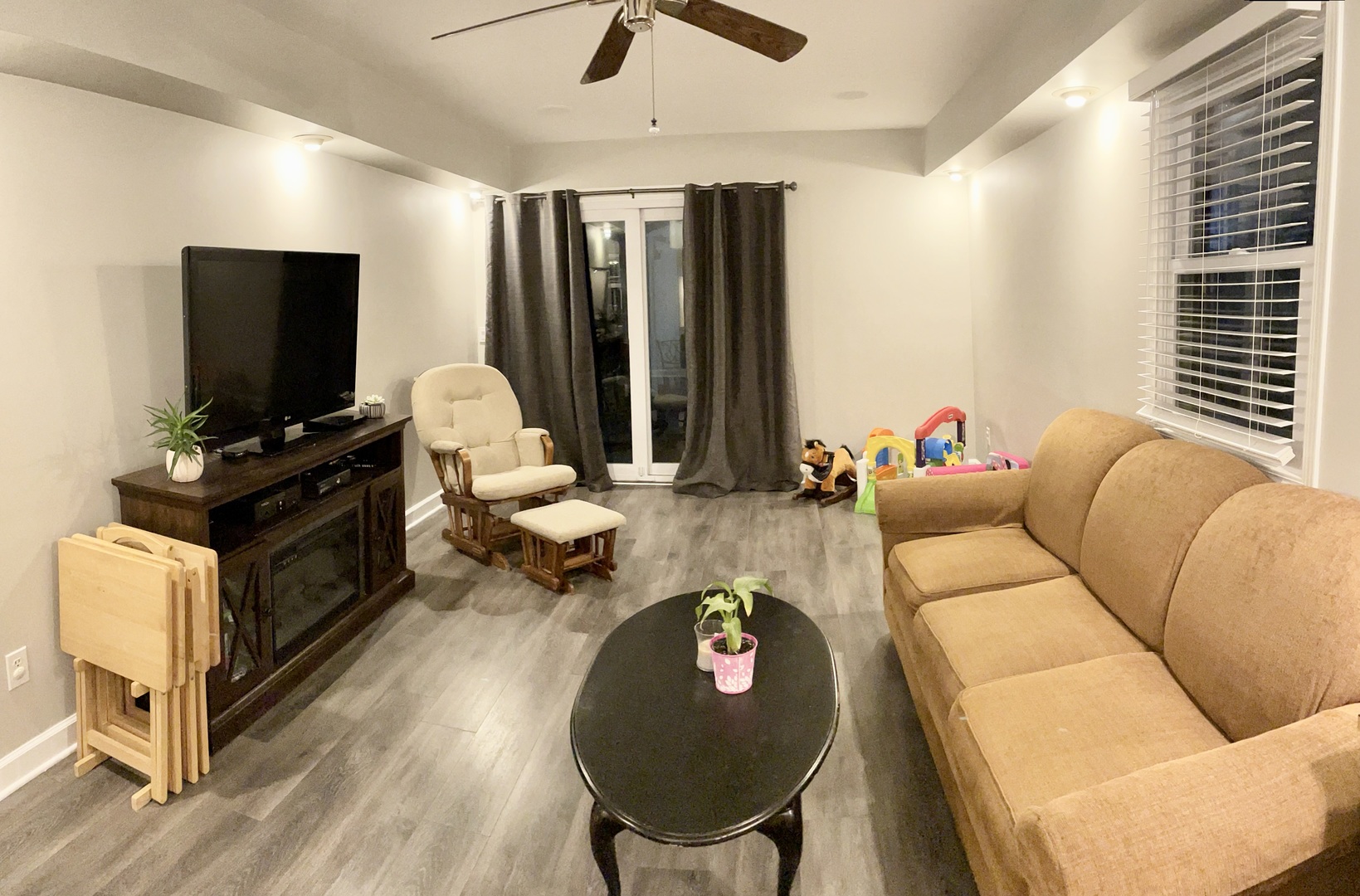 67 Stratford Road Montgomery, IL 60538 - Photo 10 of 33 a living room with furniture and a flat screen tv