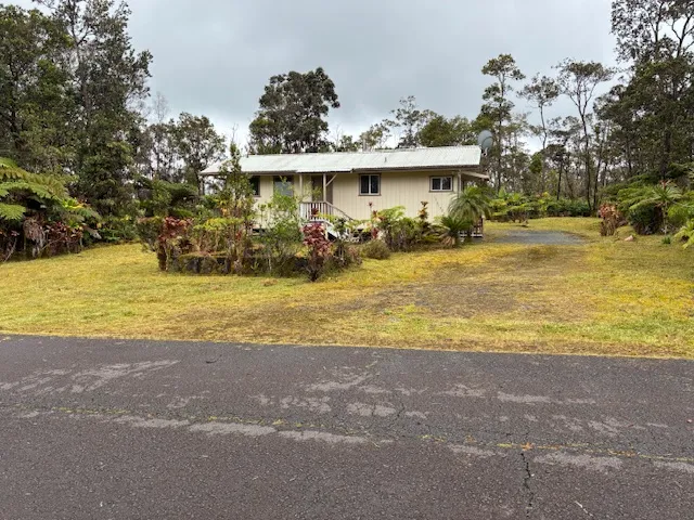 a view of a house with a swimming pool