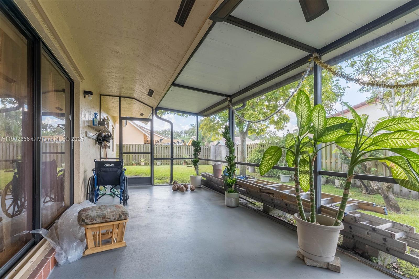 5641 Thistledown Terrace Davie, FL 33331 - Photo 22 of 36 a house with outdoor seating space