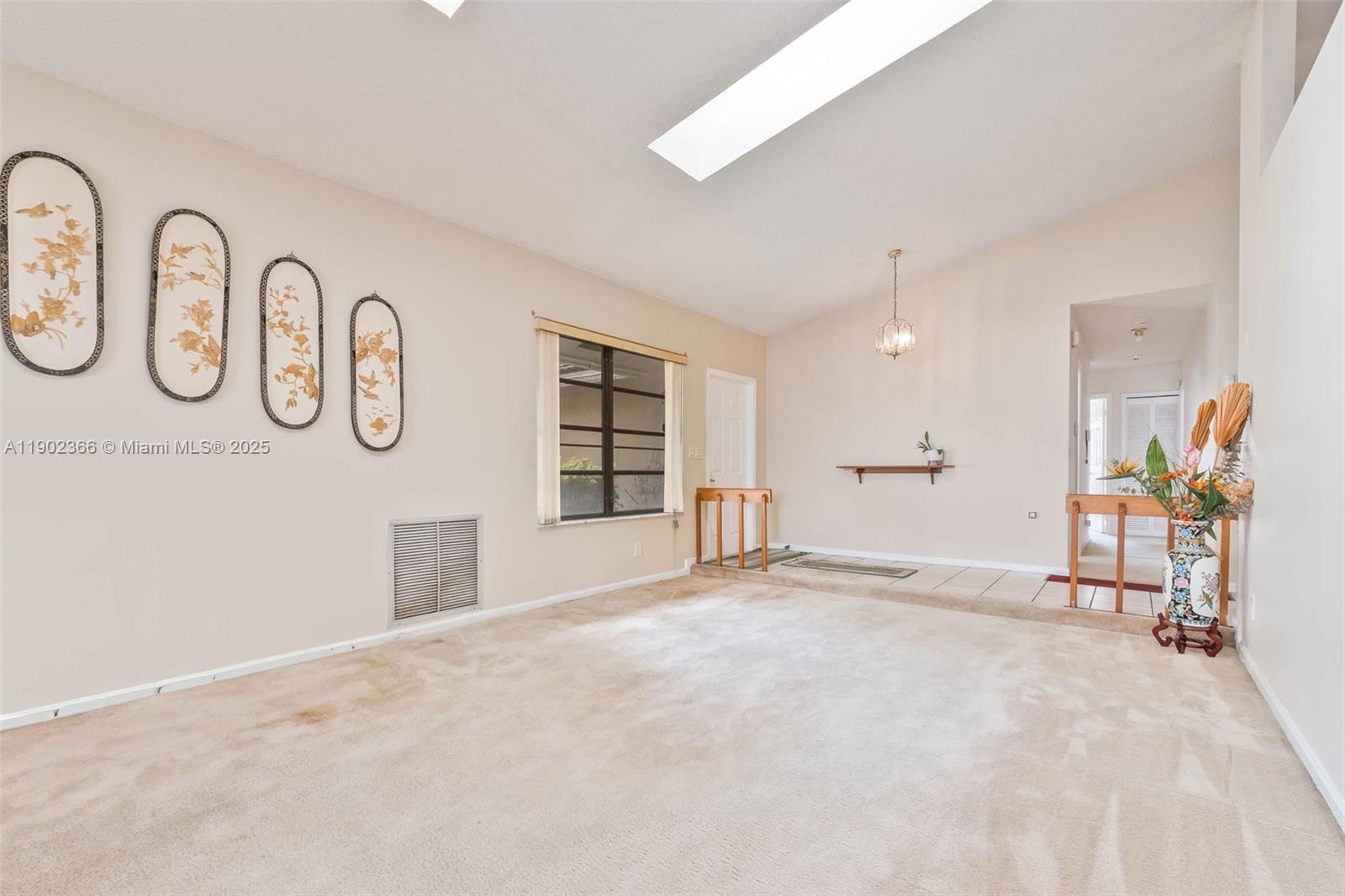 5641 Thistledown Terrace Davie, FL 33331 - Photo 8 of 36 a view of an empty room and a window