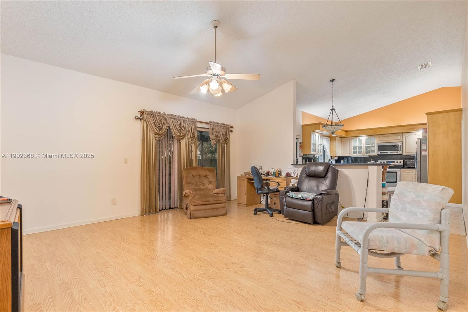 5641 Thistledown Terrace Davie, FL 33331 - Photo 10 of 36 a view of a livingroom with furniture and furniture