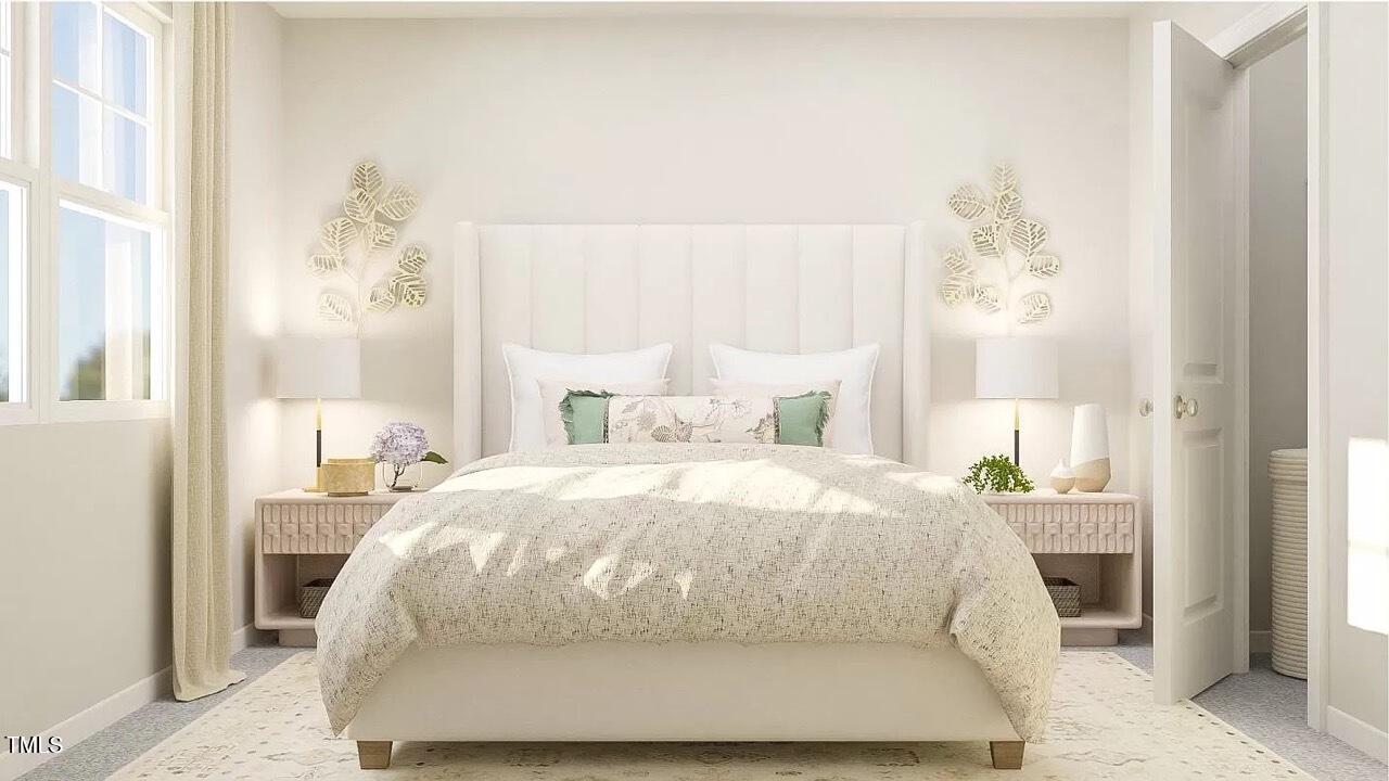 1346 Rosepine Drive Cary, NC 27519 - Photo 21 of 28 a bedroom with a bed and a window