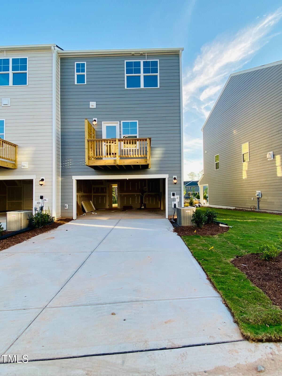 1346 Rosepine Drive Cary, NC 27519 - Photo 2 of 28 a view of house and yard with swimming pool