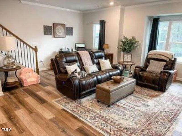 1346 Rosepine Drive Cary, NC 27519 - Photo 5 of 28 a living room with furniture or couch and a potted plant