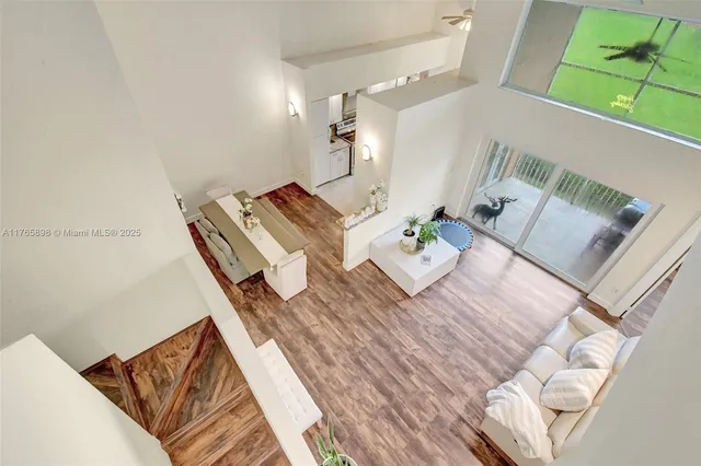 a bathroom with a sink toilet and a mirror