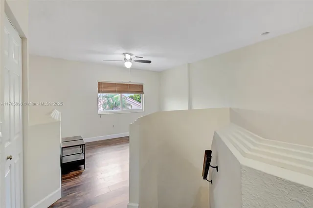 a utility room with cabinets
