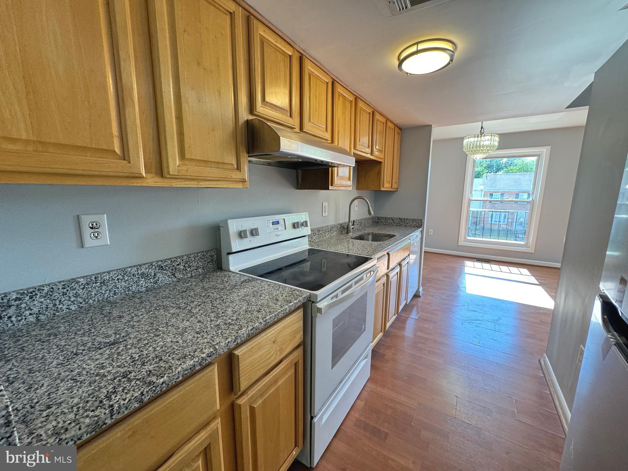 75 Timber Rock Road Gaithersburg, MD 20878 - Photo 8 of 32 Kitchen with new granite counter tops
