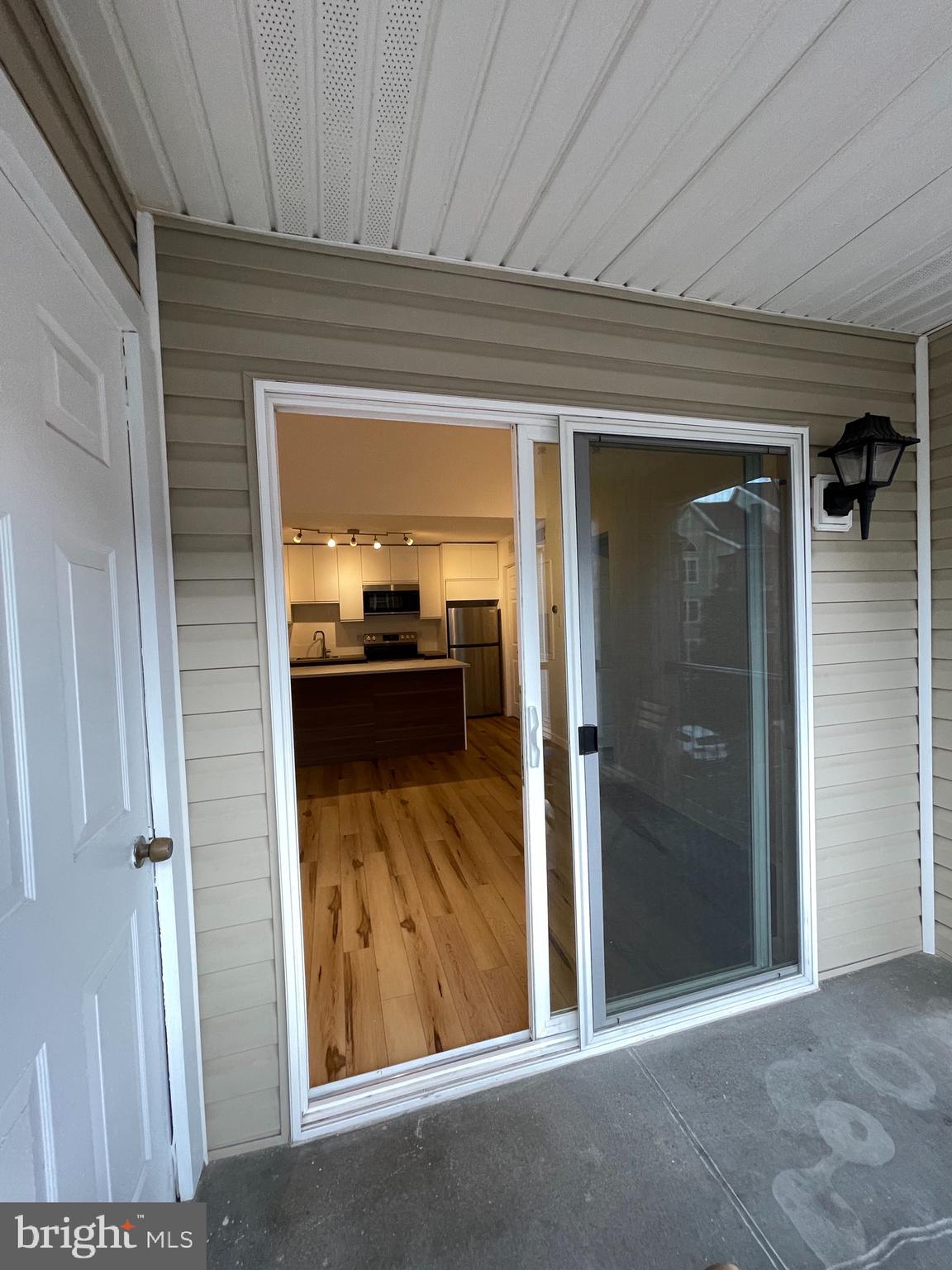 3310 Wyndham Circle, Unit 314 Alexandria, VA 22302 - Photo 12 of 31 wooden floor and window in a room