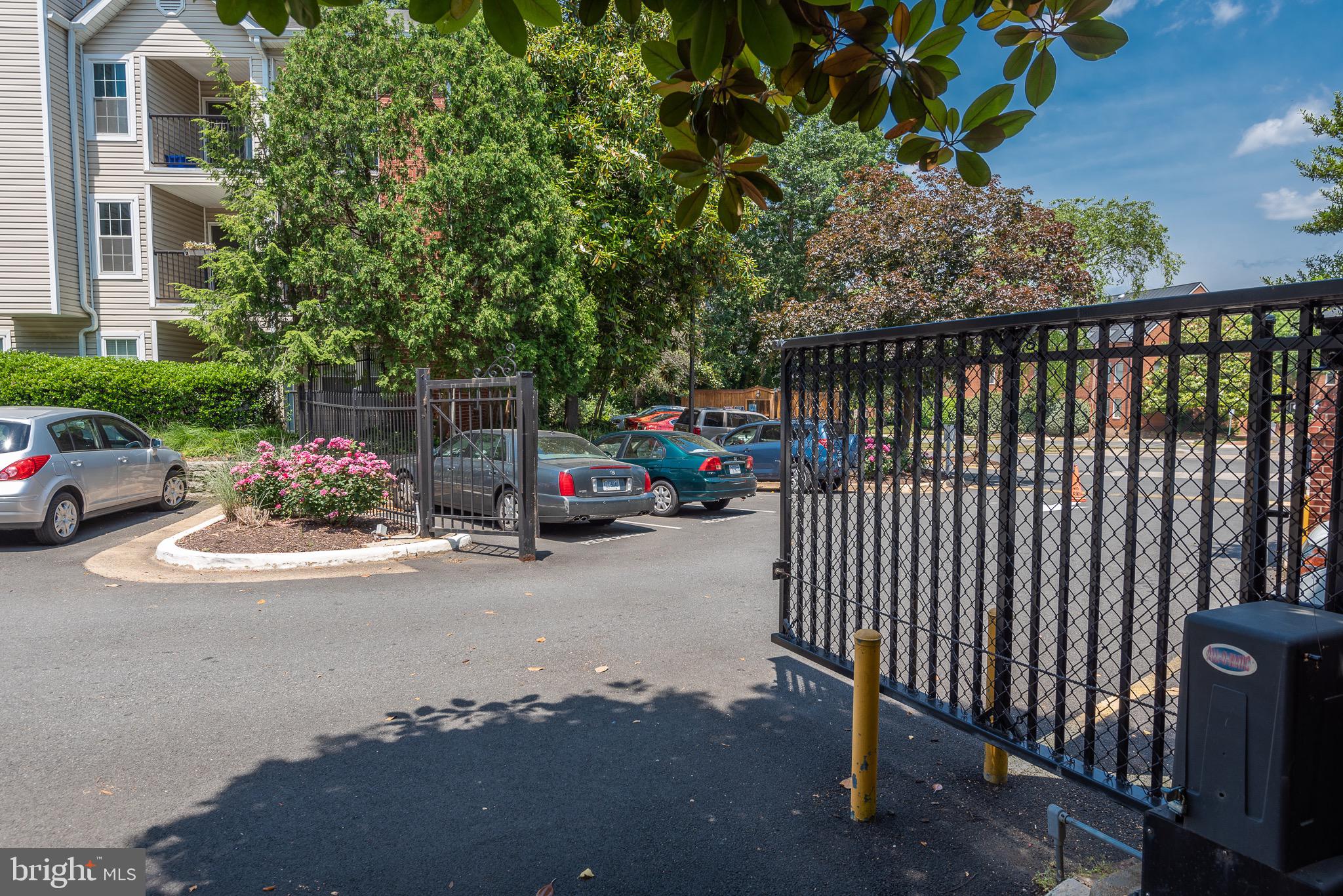 3310 Wyndham Circle, Unit 314 Alexandria, VA 22302 - Photo 16 of 31 a view of street with cars