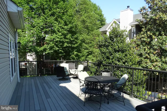 a view of a swimming pool with a yard