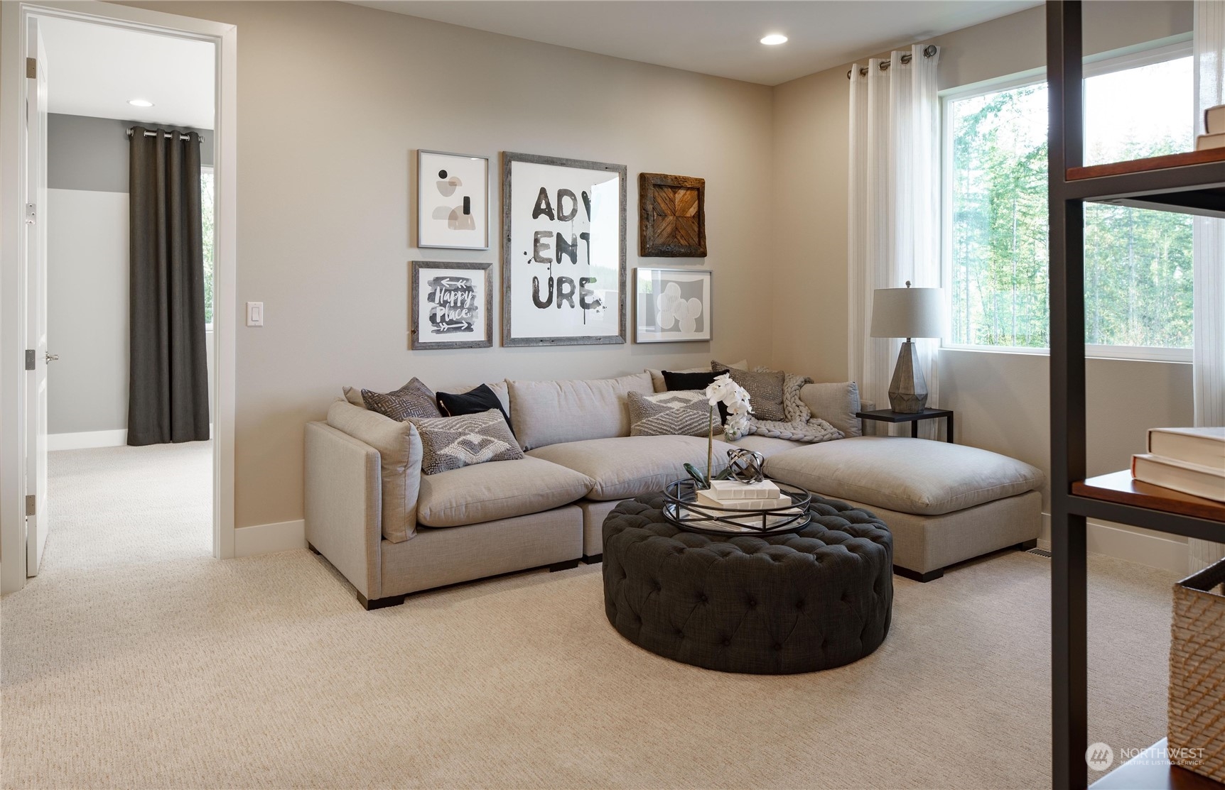 3906 Northeast 27th Place, Unit 2 Renton, WA 98056 - Photo 9 of 18 a living room with furniture and a window