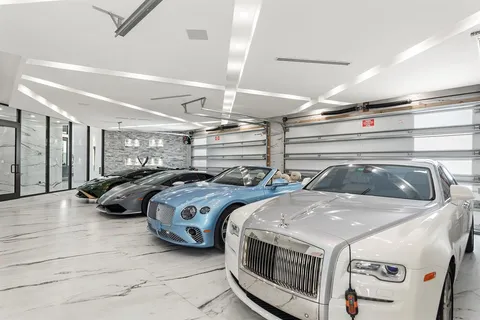 a living room with furniture a rug and a large window