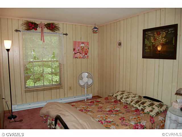 2937 New Hope Road Powhatan, VA 23139 - Photo 7 of 12 Master Bedroom - Master bedroom has an attached 1/
