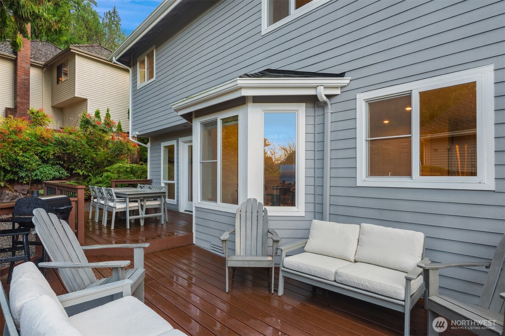 10330 Northeast 151st Place Bothell, WA 98011 - Photo 28 of 38 a view of a patio with couches chairs and potted plants