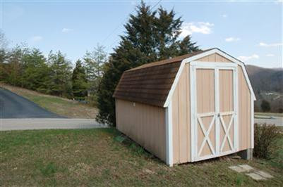 13 Raintree Court Irvine, KY 40336 - Photo 2 of 9 Large outside building overlooking the v