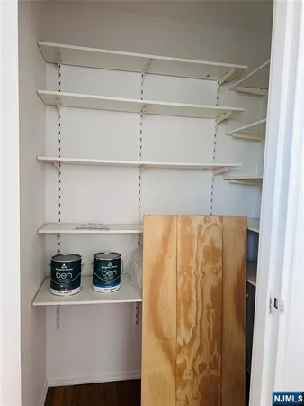 a white refrigerator freezer sitting inside of a kitchen