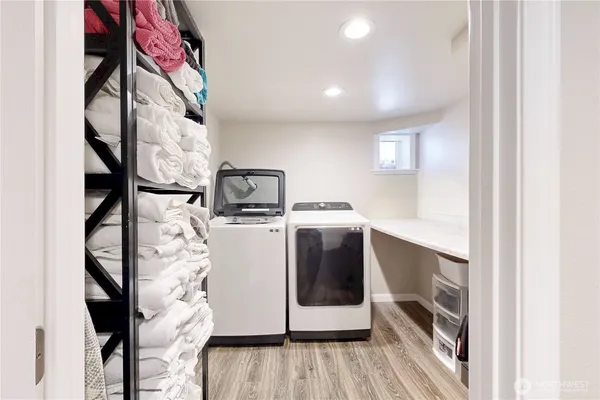 a utility room with dryer and washer