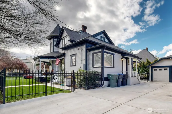 a view of a patio with a table and chairs