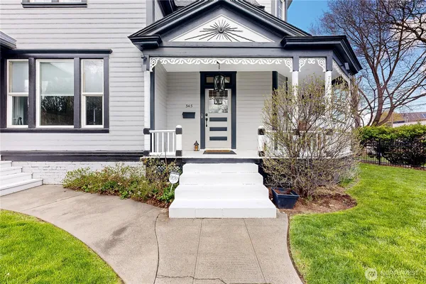 a view of a back yard with an umbrella