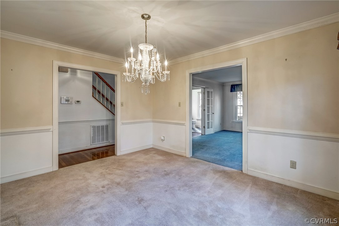 6205 Lansgate Road Midlothian, VA 23112 - Photo 15 of 50 a view of a big room with chandelier and entryway