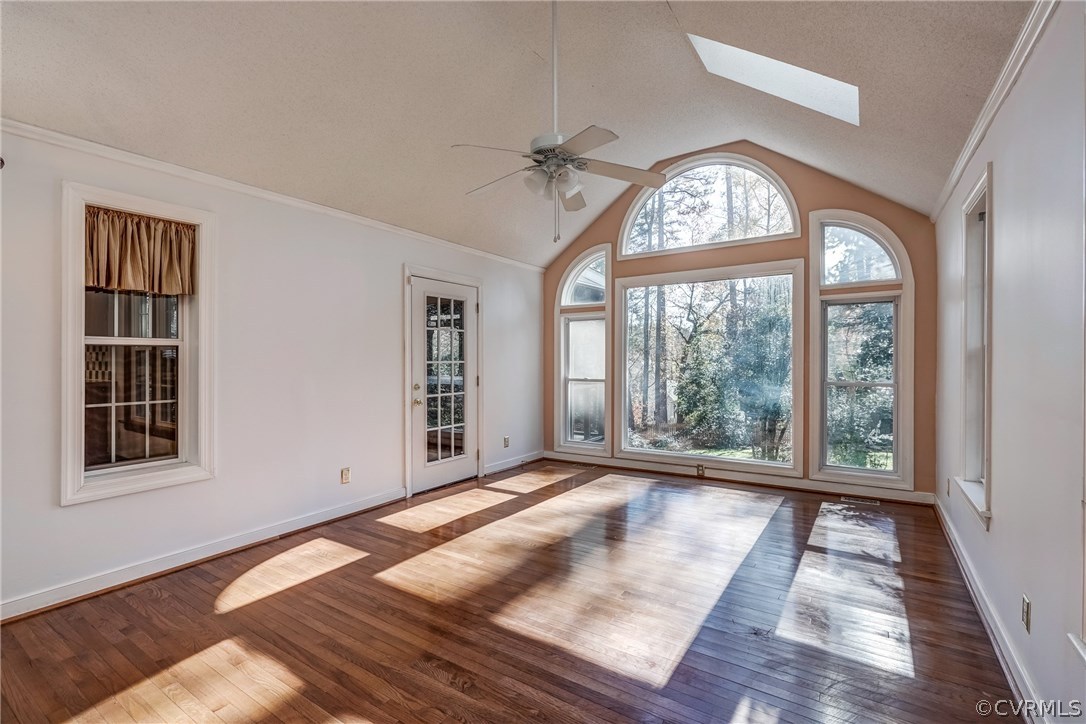 6205 Lansgate Road Midlothian, VA 23112 - Photo 19 of 50 wooden floor chandelier and windows in a room